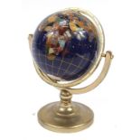 Gilt brass semi precious stone table globe, 26cm high