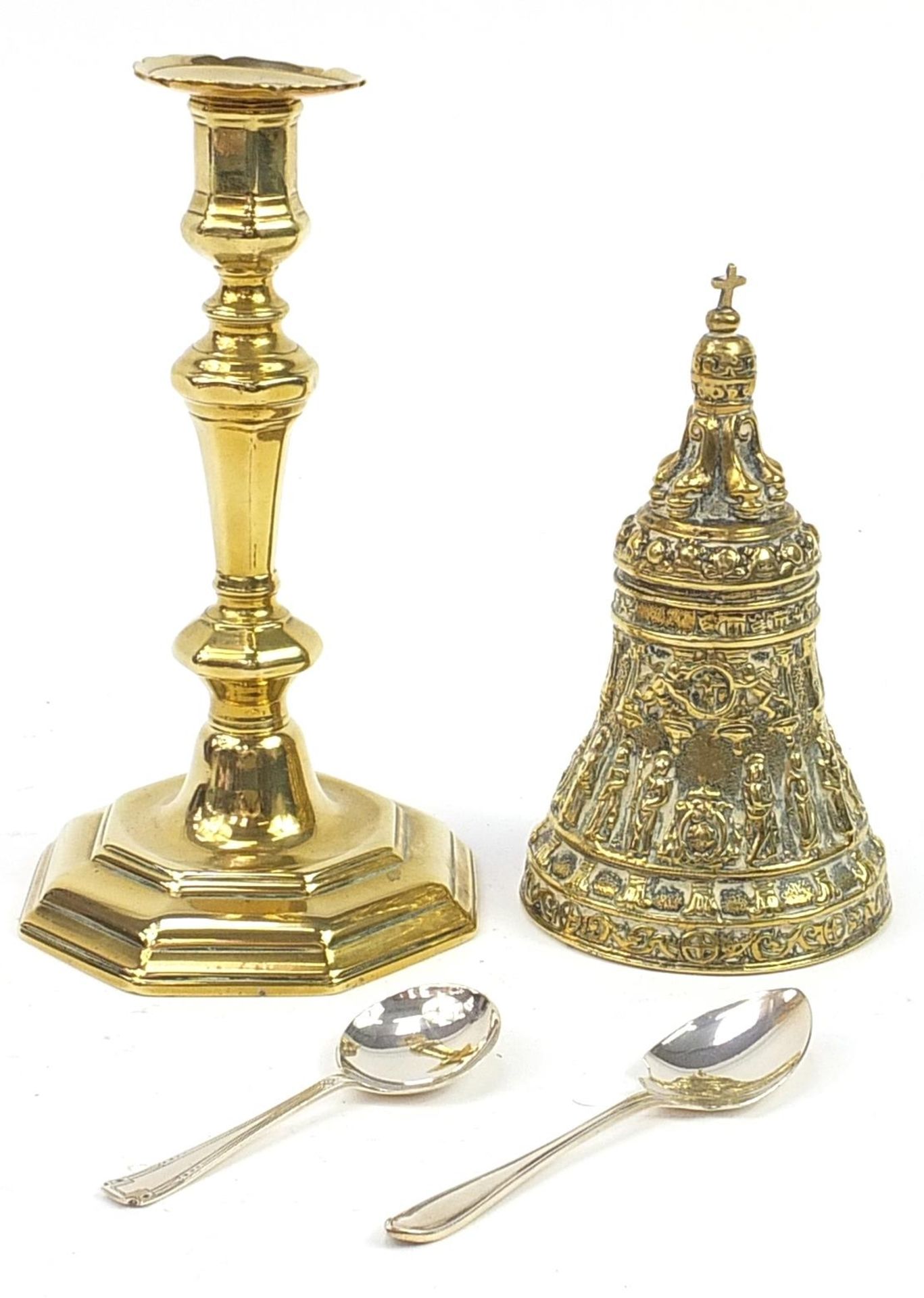 Metalware comprising a heavy gilt brass bell, candlestick and two silver spoons, the largest 23cm - Image 2 of 4