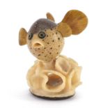 Carved Tagua nut of a puffer fish, 6.5cm high