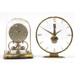 Two vintage clocks comprising Schatz and Estyma, the largest 16.5cm high