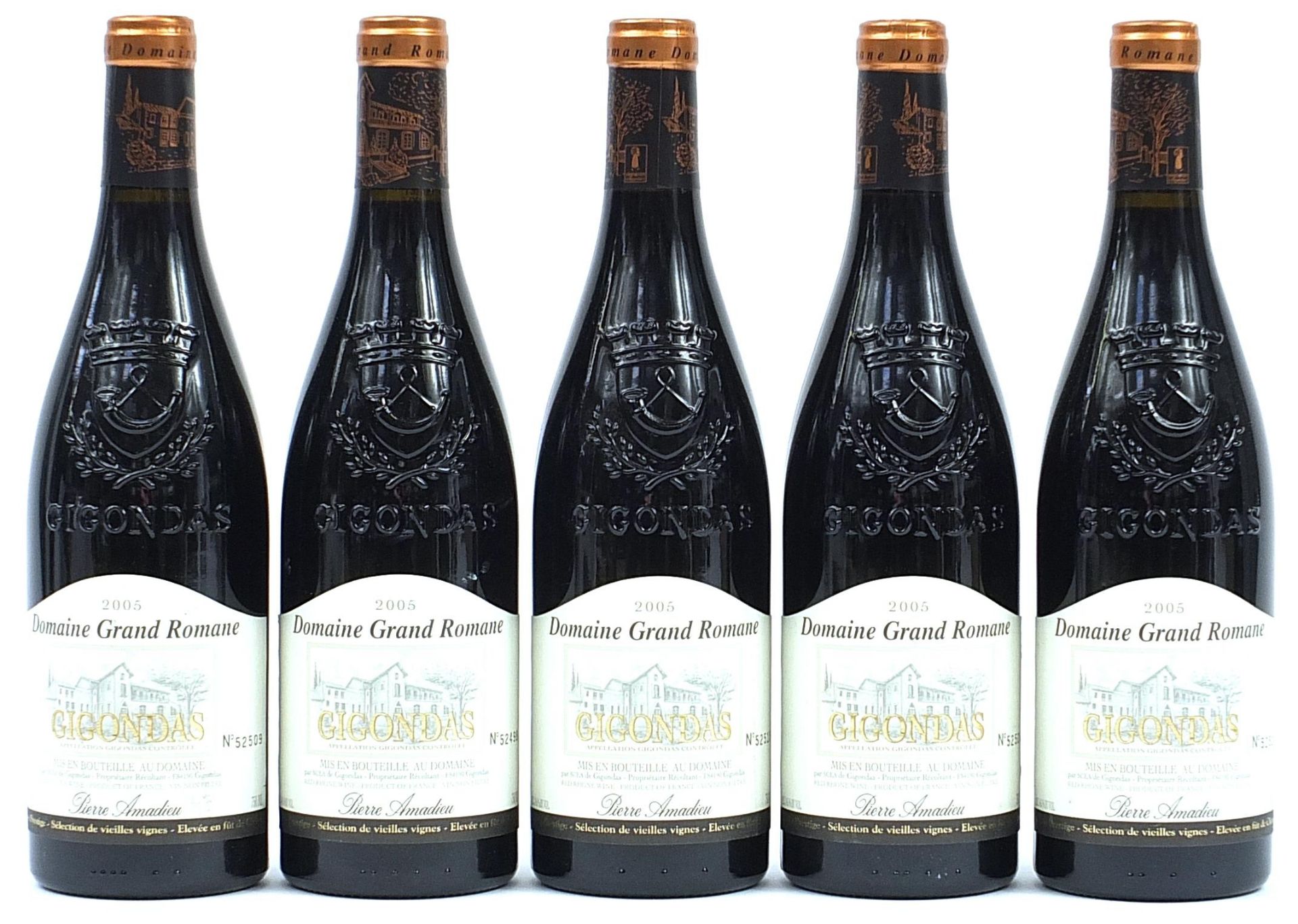 Five bottles of 2005 Domaine Grand Romaine Gigondas Cuvee red wine