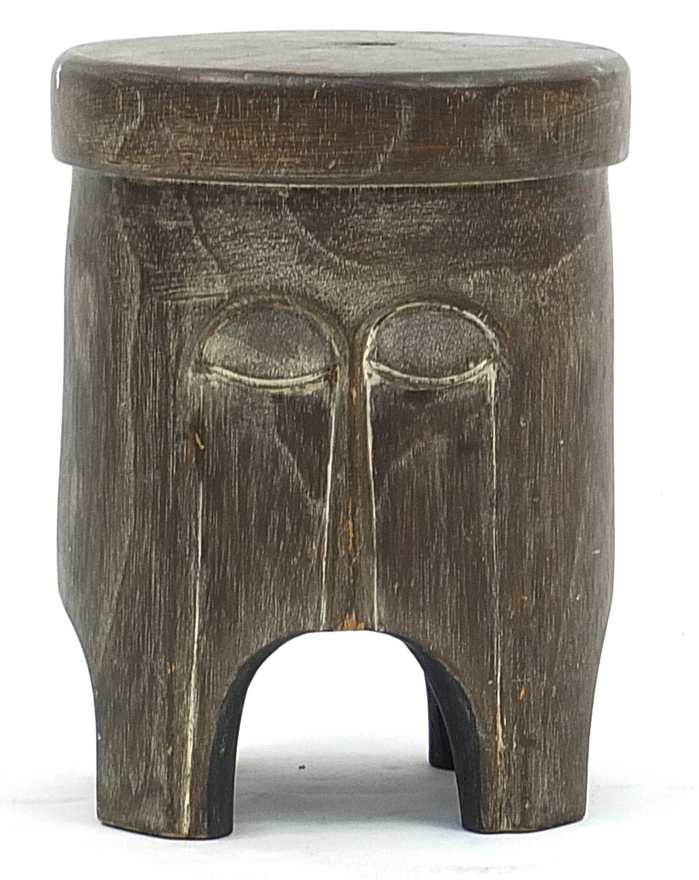 African carved wood face mask stool, made in Ghana label to the underside, 63cm high x 27cm in