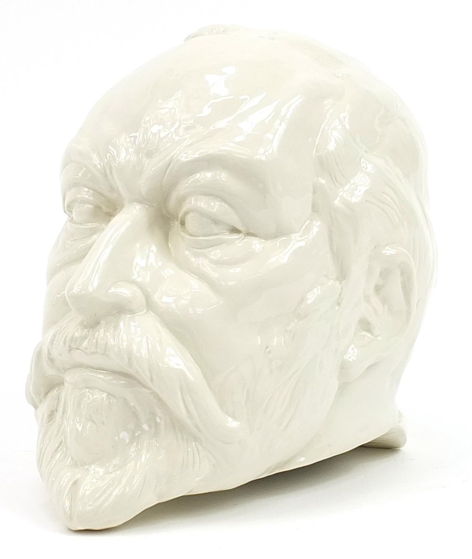 Michael Sutty, commemorative white glazed porcelain bust of King George V, 27cm high