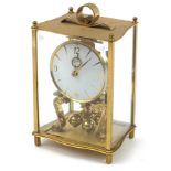 Kundo brass cased anniversary clock, 21cm high