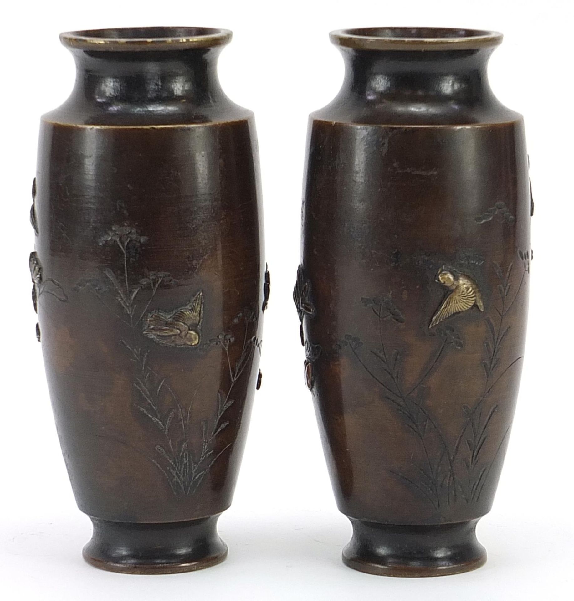 Pair of Japanese patinated bronze vases decorated in relief with birds and flowers, 15cm high - Image 2 of 3