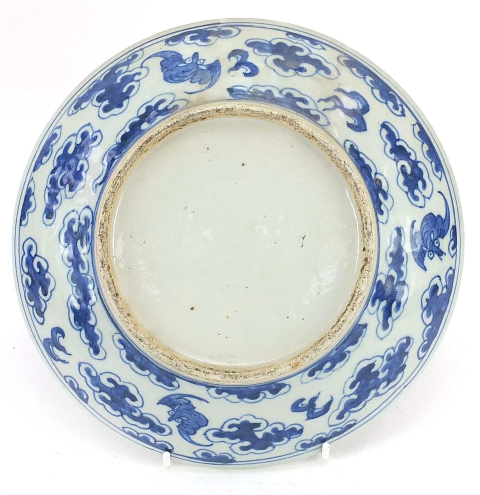 Chinese blue and white porcelain plate hand painted with two dragons chasing a flaming pearl amongst - Image 2 of 2