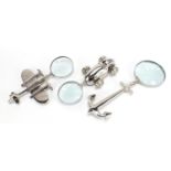 Three novelty silver plated magnifying glasses in the form of an aeroplane, racing car and anchor,