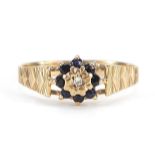 9ct gold sapphire and diamond flower head ring, size Q, 1.8g