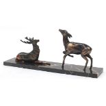 Art Deco patinated spelter group of deer on a marble base, 47.5cm in length
