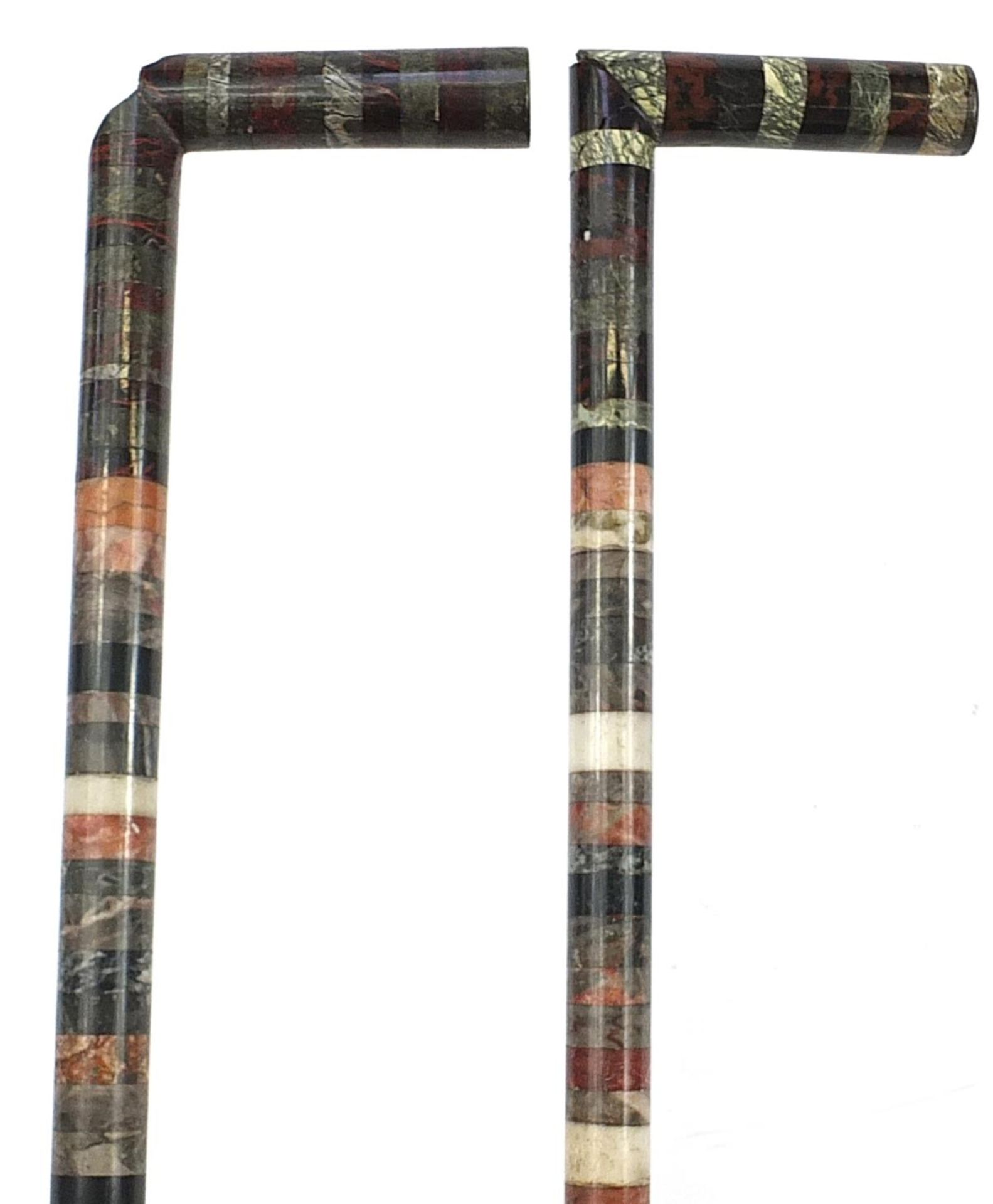 Pair of specimen marble sectional walking sticks, each 89.5cm in length