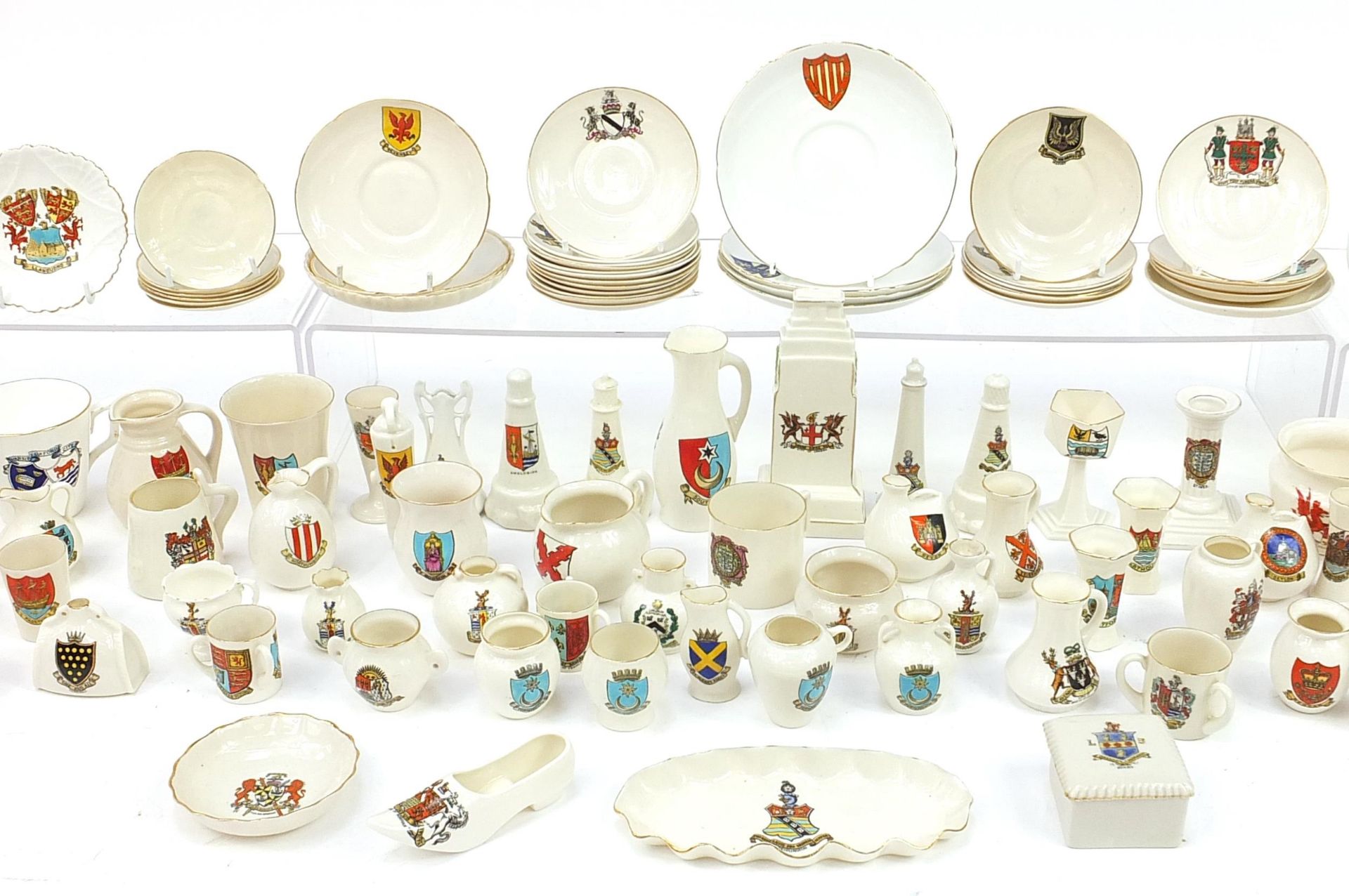 Collection of crested china, some Goss including lighthouses, cauldrons, shoe, cannon and saucers - Image 3 of 4