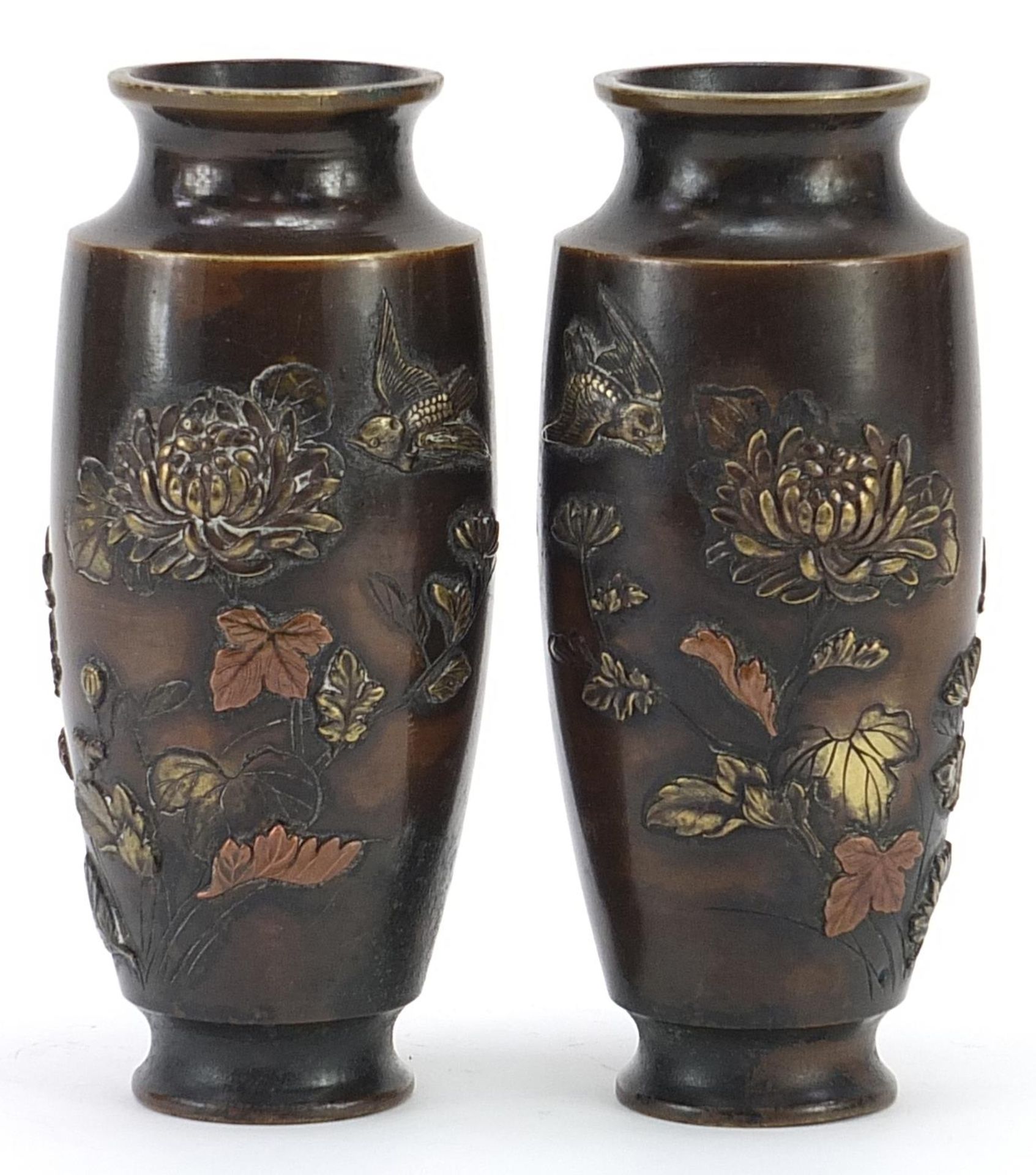 Pair of Japanese patinated bronze vases decorated in relief with birds and flowers, 15cm high