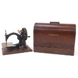 Two Victorian sewing machines comprising Willcox & Gibbs and Singer, the largest 44cm in length