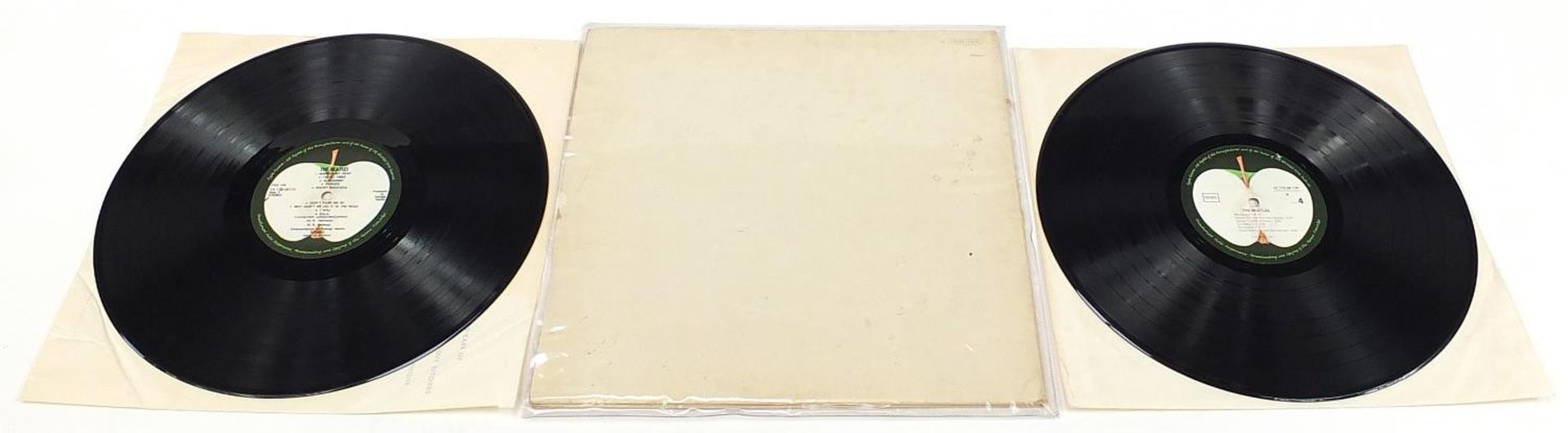 Four White Album vinyl LP records by The Beatles with poster and four pictures to include numbers - Image 11 of 17