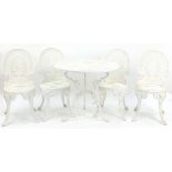 White painted aluminium garden table and four chairs, the table 69cm high x 80cm in diameter