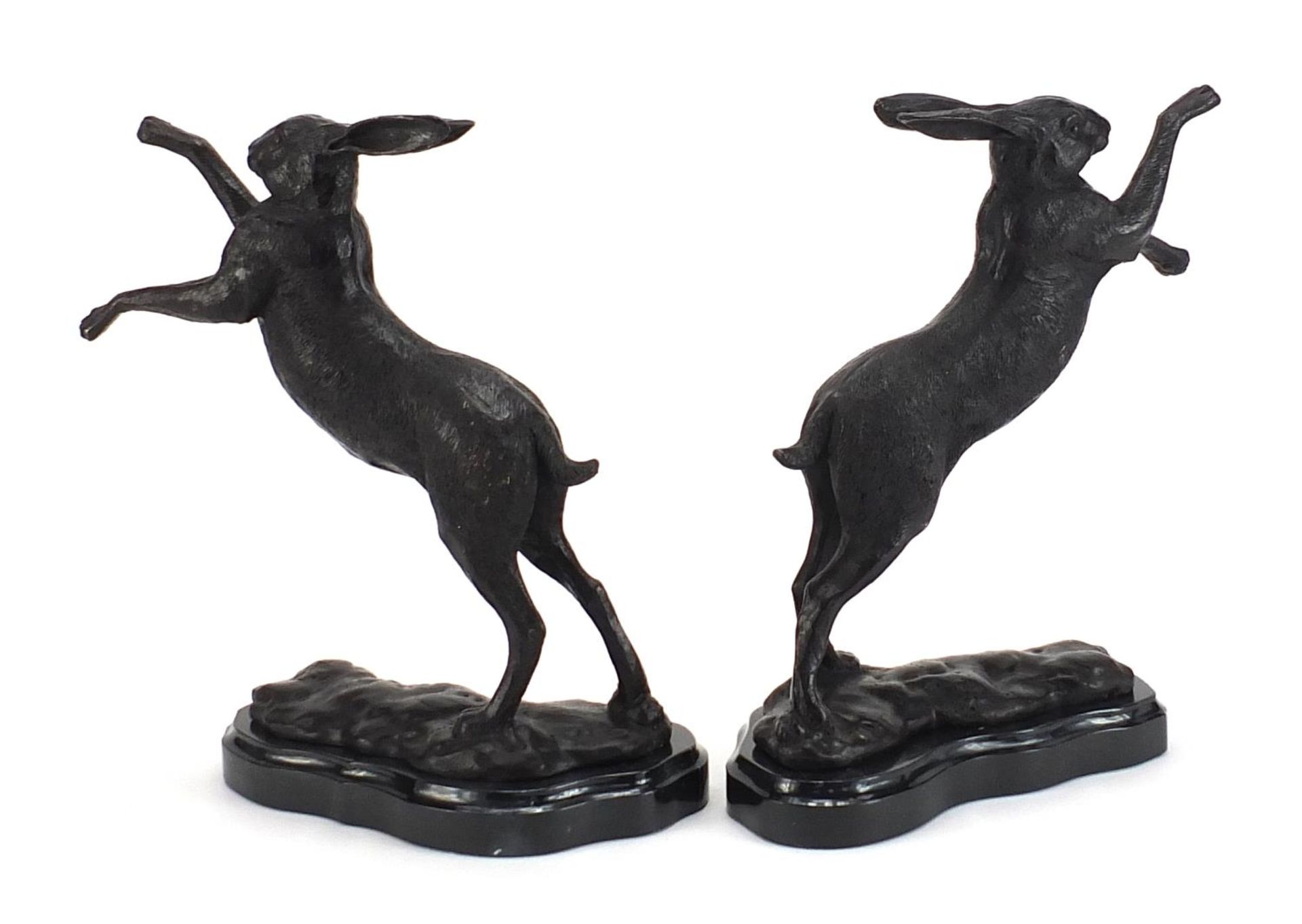Pair of patinated bronze boxing hares raised on shaped marble bases, each 30cm high - Image 2 of 3