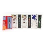 Swatch, four Swatch Collector's Club wristwatch sets including two Mystery watches