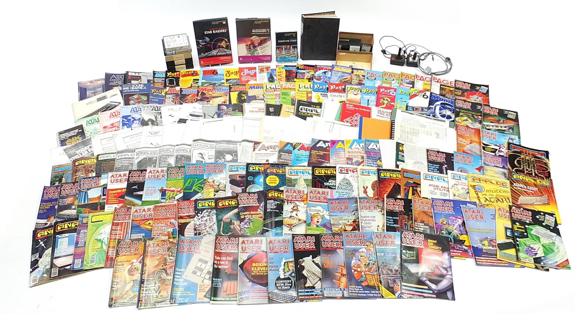 Collection of Atari accessories, cassettes and instructions