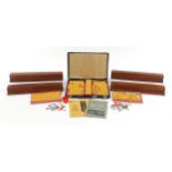 Chinese Mahjong set with wooden tile stands