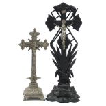 Two religious interest altar crucifixes including a ebonised carved wood example, the largest 54cm