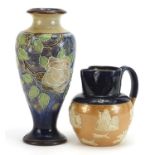 Royal Doulton baluster vase hand painted with stylised flowers and a hunting jug, the largest 29cm