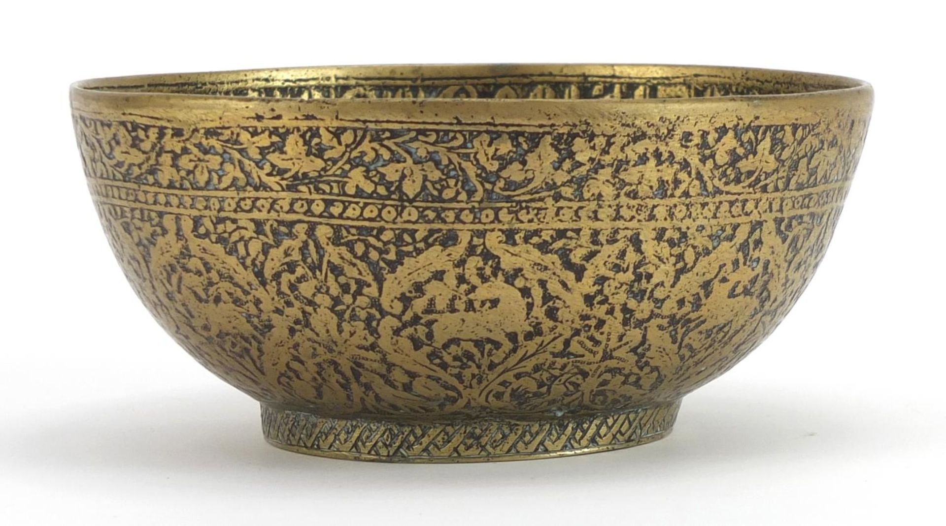 Islamic brass bowl engraved with wild animals and calligraphy, 14cm in diameter