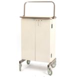 Industrial metal medical cabinet with Bristol Maid label, 110cm high