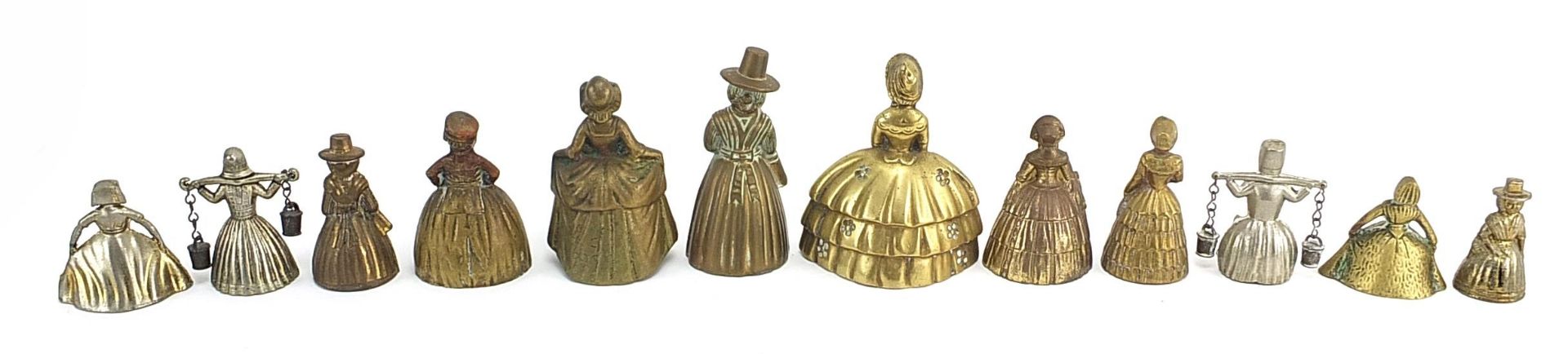 Twelve brass and white metal Crinoline Lady table bells, the largest 10.2cm high - Image 4 of 6