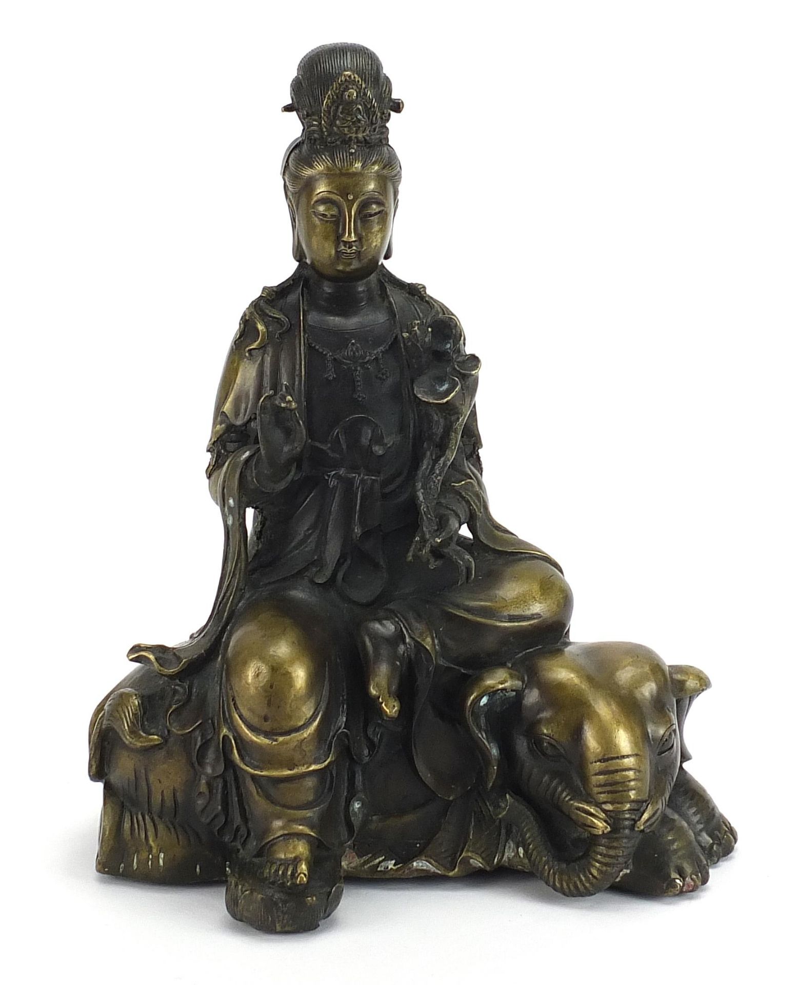 Chinese patinated bronze study of Guanyin seated on an elephant, 29.5cm high