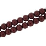 Islamic cherry amber coloured bead prayer necklace, 42cm in length
