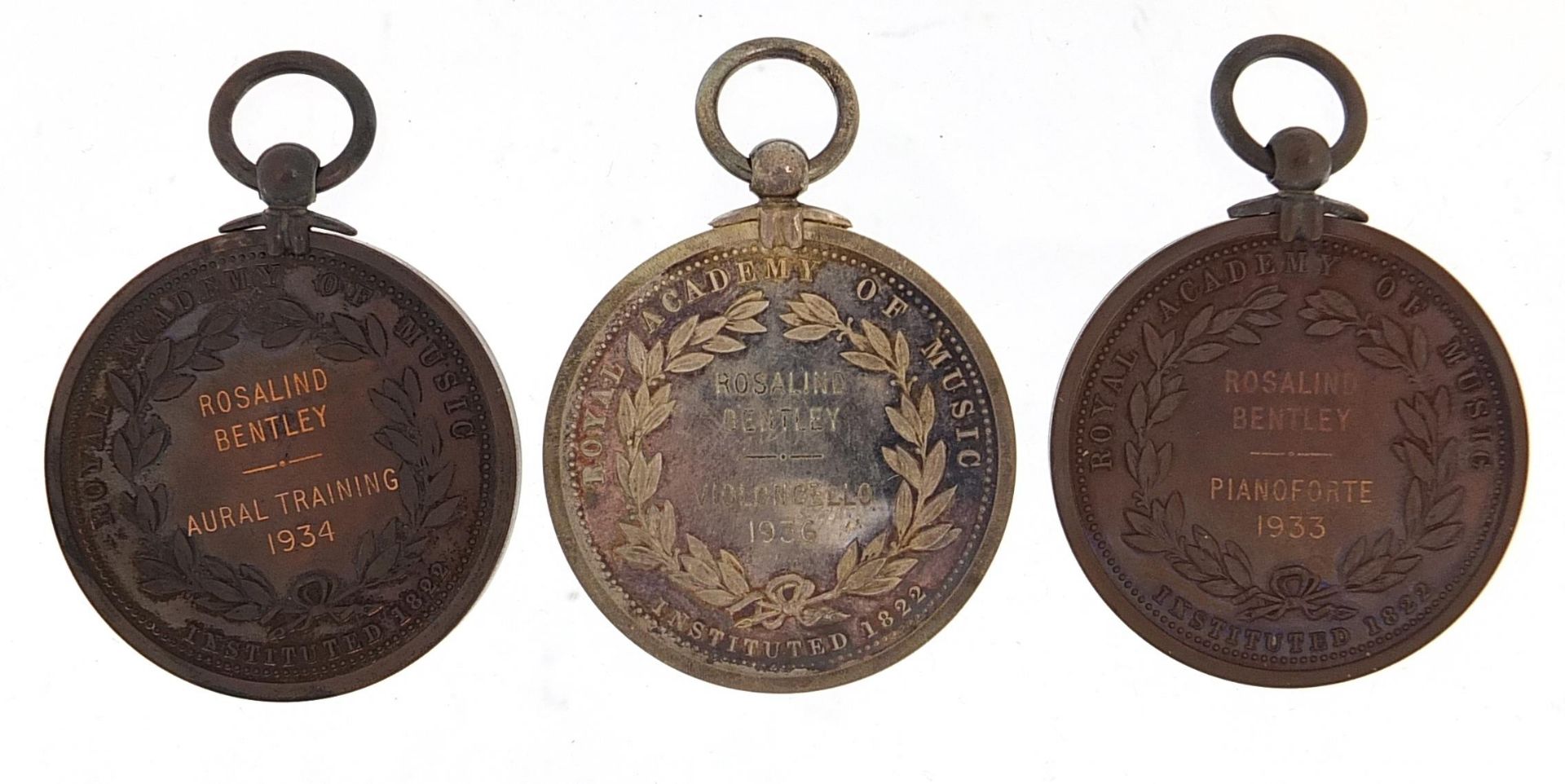 Three John Pinches London Royal Academy of Music medals for Rosalind Bentley housed in velvet - Image 3 of 4