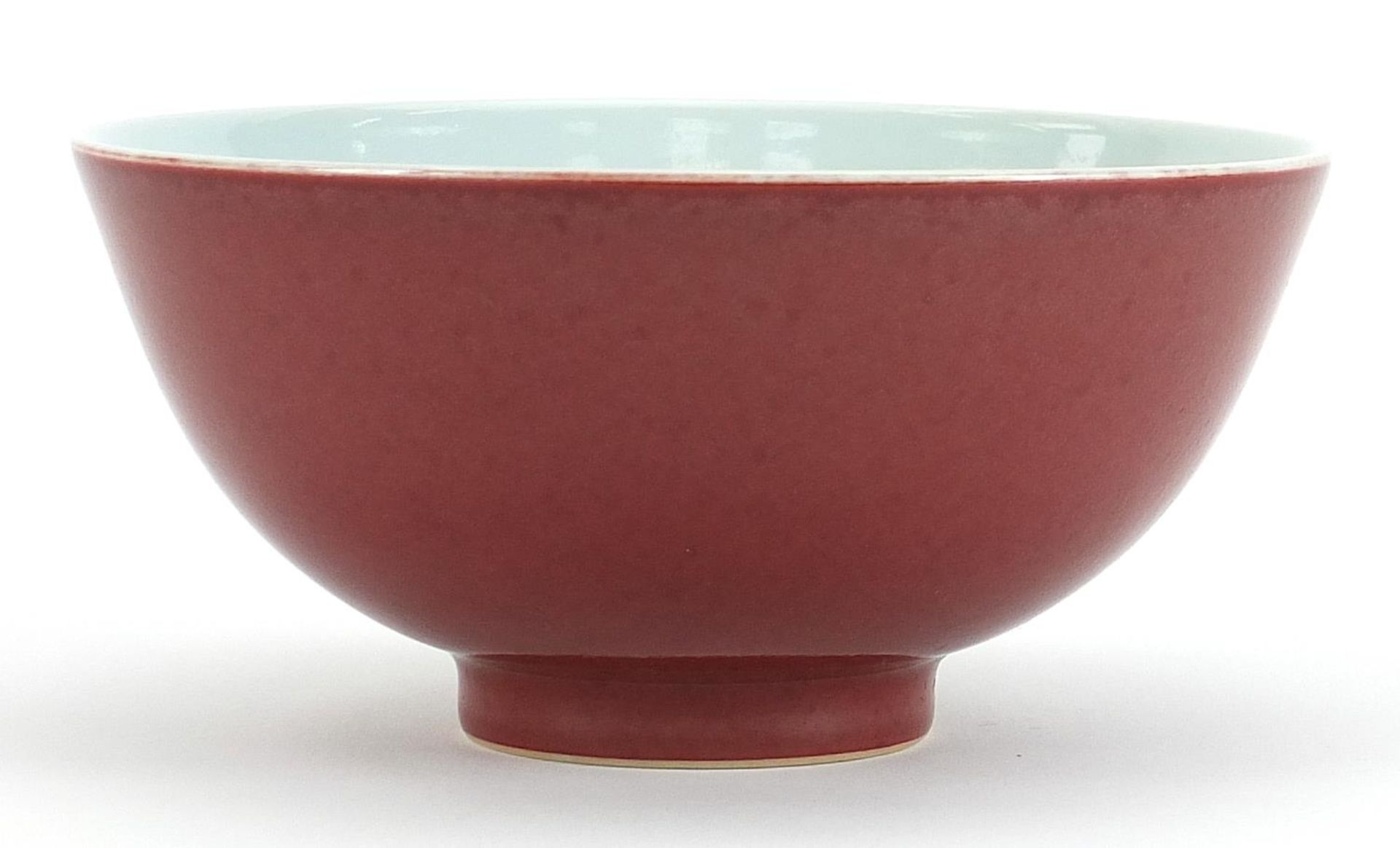 Chinese porcelain bowl having a sang de boeuf glaze, six figure character marks to the base, 14.