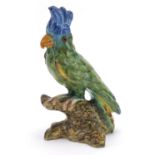 Mosanic, continental pottery parrot with beaded eyes, 26.5cm high