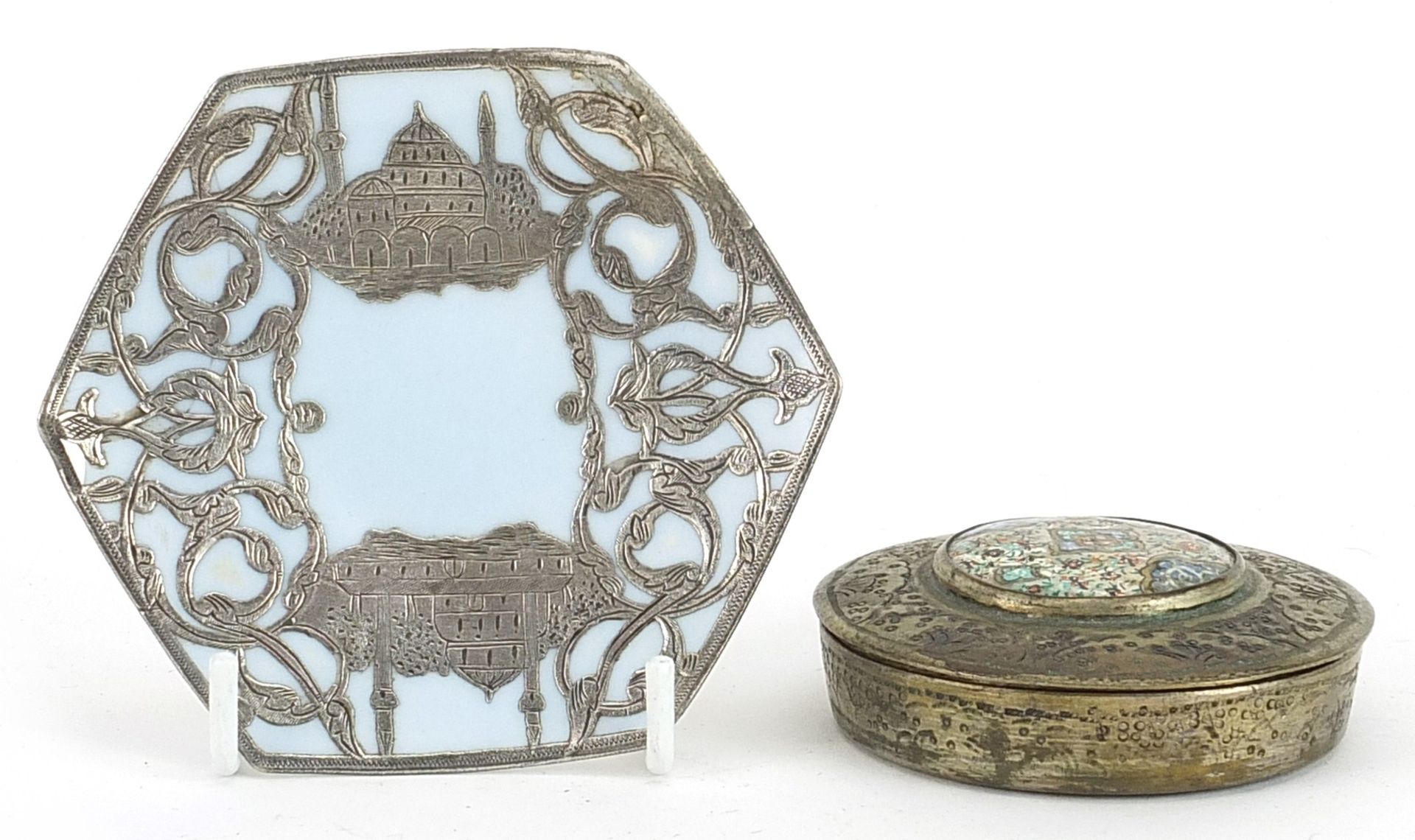 Islamic white metal box and cover and a porcelain dish with white metal overlay, the largest 9.5cm