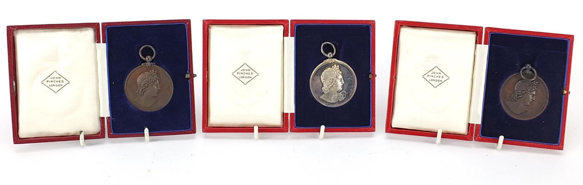 Three John Pinches London Royal Academy of Music medals for Rosalind Bentley housed in velvet
