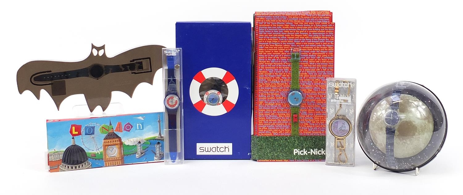 Swatch, six Swatch Collector's Club wristwatches with boxes and cases including The Moon, Batman and