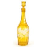 Bohemian amber flashed cut glass decanter etched with leaves, 32cm high