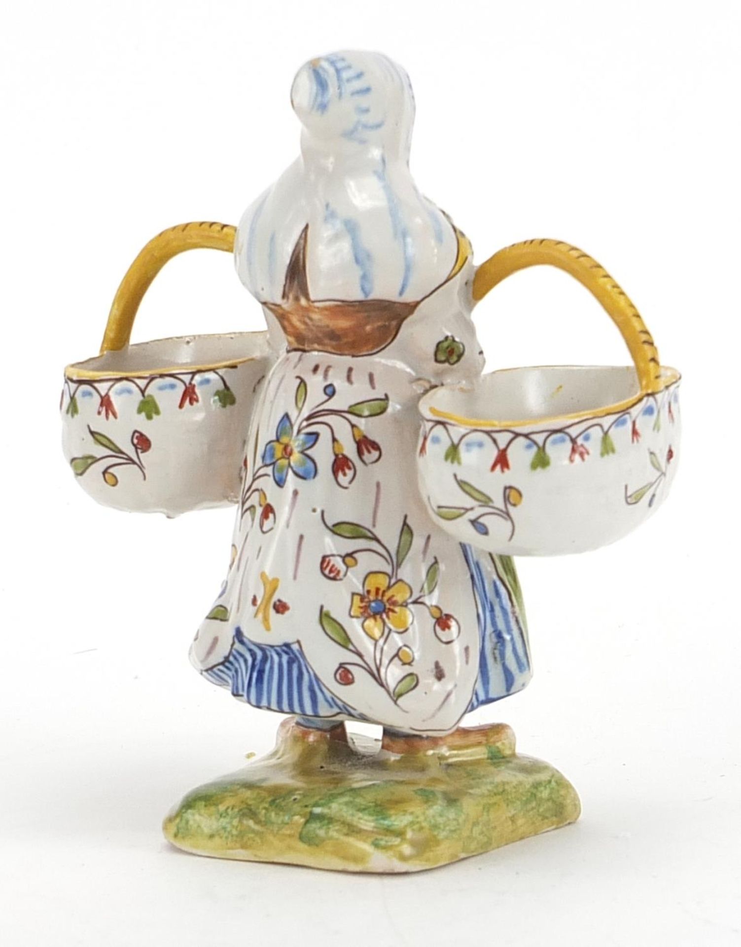 French faience glazed double table salt in the form of a maid holding two baskets, inscribed - Image 2 of 3