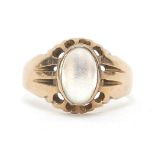 9ct rose gold cabochon moonstone ring with pierced setting, size O, 4.1g