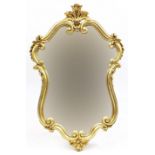 Gilt framed cartouche shaped wall mirror, 98cm x 64cm