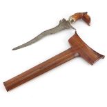 Middle Eastern Sumatran kris dagger with carved hardwood handle and sheath, 30cm in length