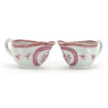 Pair of Chinese porcelain pink monochrome sauce boats hand painted with flowers, each 19cm in length