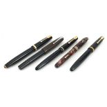 Five vintage fountain pens, four with gold nibs including three Parker