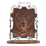 Arts & Crafts copper and wrought iron fire screen embossed with a phoenix, mounted on a later