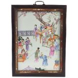 Rectangular Chinese porcelain panel housed in a hardwood frame, the panel hand painted in the