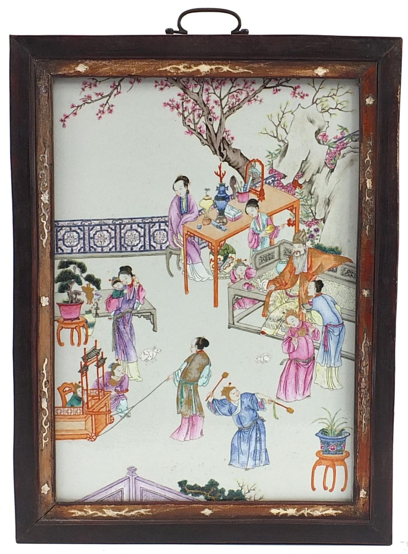 Rectangular Chinese porcelain panel housed in a hardwood frame, the panel hand painted in the