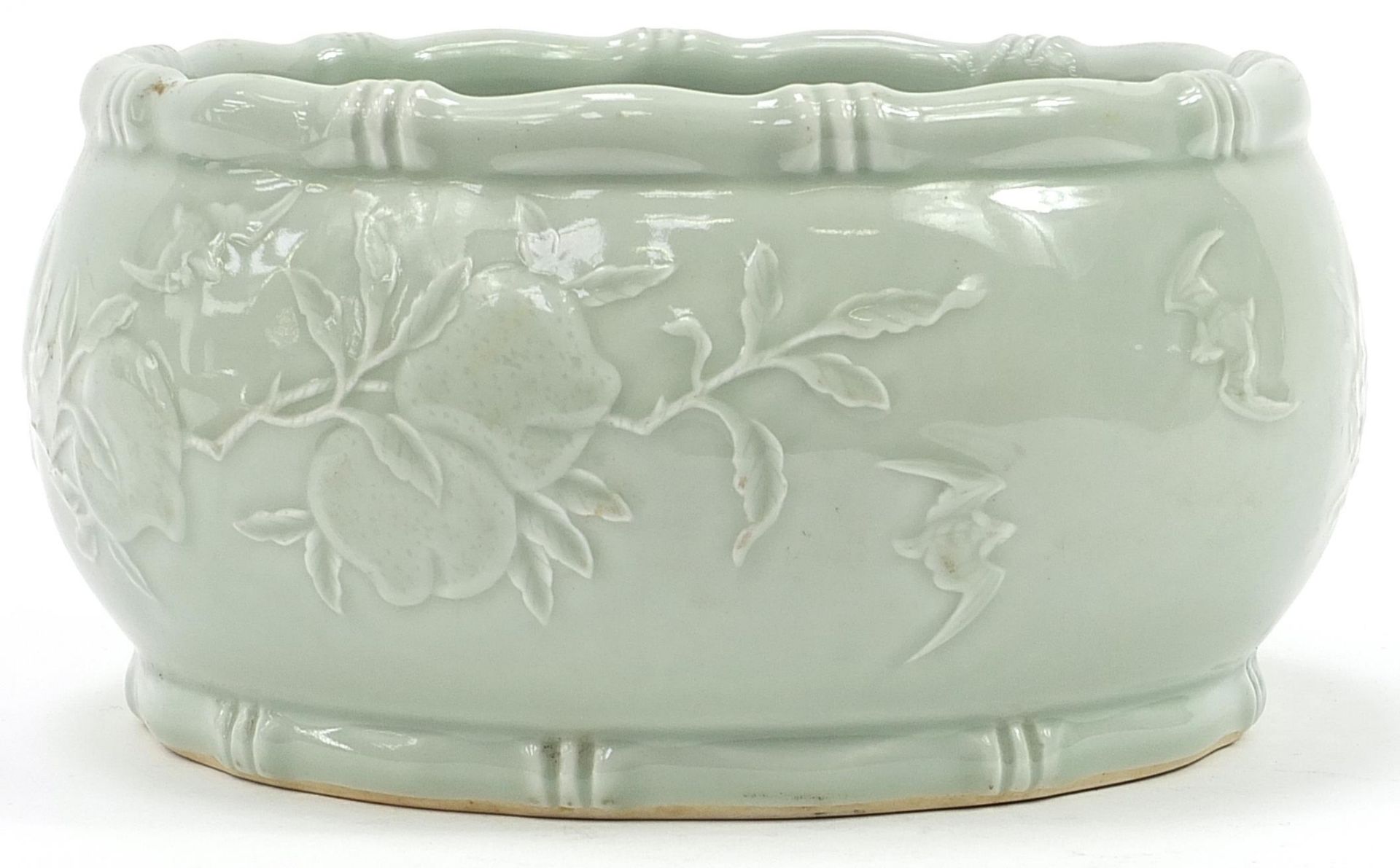 Good Chinese porcelain bowl having a celadon glaze decorated in low relief under glaze with peaches, - Image 2 of 4