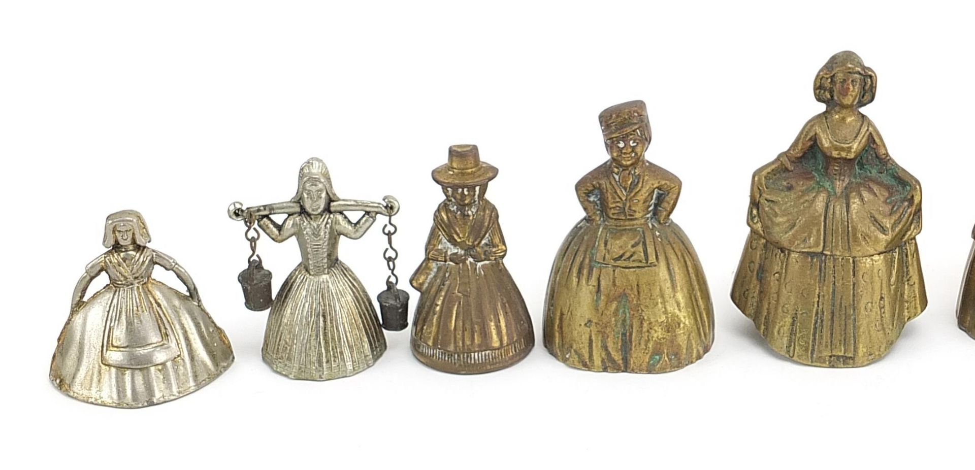 Twelve brass and white metal Crinoline Lady table bells, the largest 10.2cm high - Image 2 of 6