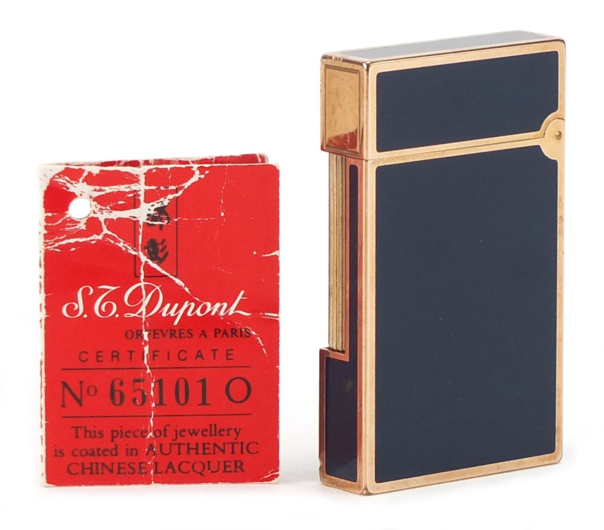 S J Dupont gold plated and blue enamel pocket lighter with certificate numbered 651010, the