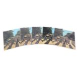 Five Abbey Road vinyl LP records by The Beatles including one with misaligned Apple sleeve, each